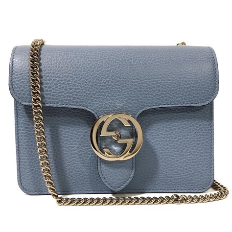 gucci outlet interlocking blue bag.